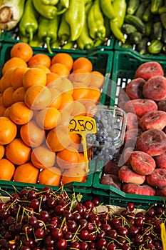 Fruits and vegetables in boxes are sold on the European market