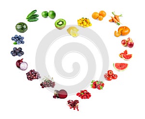 Fruits and vegetables. Heart of mixed fruits, berries and vegetables on white background. Fresh food