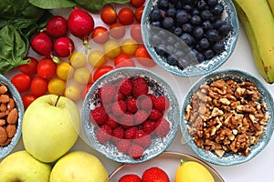 Fruits, Vegetables And Nuts On White Background