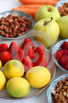 Fruits, Vegetables And Nuts On White Background