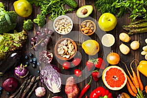 Fruits and vegetables in ranbow colours top view photo