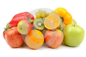 Fruits and vegetables in a wicker basket isolated on a white