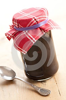 Fruity jam in glass jar