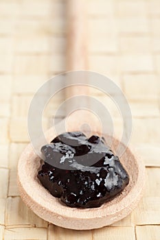 Fruity jam on spoon
