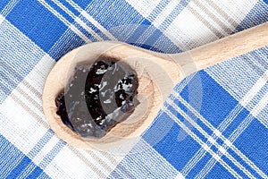 Fruity jam on spoon