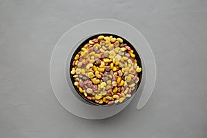 Fruity Kids Breakfast Cereal with Milk in a Bowl, top view