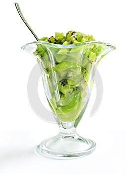 Fruity kiwi dessert in the glass wase isolated