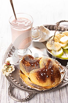 Fruity oghurt smoothie,bun and fresh fruit for breakfast photo