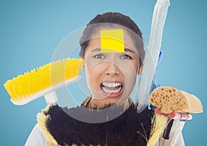 Frustrate woman with sticky notes stick on forehead holding cleaning equipment