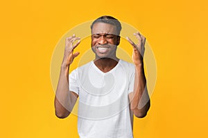 Frustrated Afro Man Gesturing With Hands Expressing Disappointment, Studio Shot