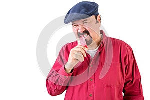 Frustrated angry man biting his credit card photo