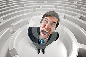 Frustrated angry man is lost in maze. 3D rendered illustration of maze