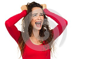 Frustrated, angry and upset woman screaming. photo