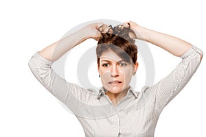 Frustrated angry woman tearing hair on his head