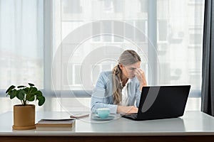 Frustrated annoyed woman confused by computer problem, annoyed businesswoman feels indignant about laptop crash, bad news online