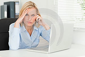 Frustrated blonde businesswoman