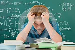 Frustrated Boy In Classroom