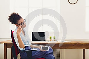 Frustrated business woman with headache at office