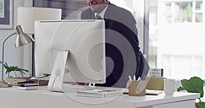Frustrated businessman, computer or desk destruction at office in anger, loss or crisis. Angry man or employee in stress