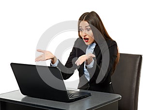 Frustrated businesswoman with laptop