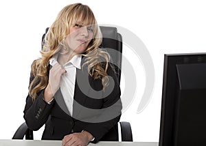 Frustrated businesswoman loosening her collar