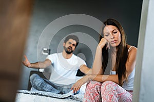 Frustrated couple arguing and having marriage problems