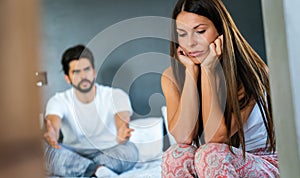 Frustrated couple arguing and having marriage problems