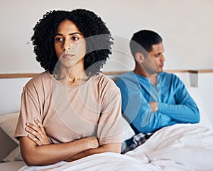 Frustrated couple, fight and conflict in breakup, argument or disagreement on bed from dispute at home. Upset woman and