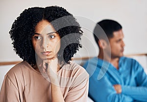 Frustrated couple, fight and conflict in divorce, argument or disagreement on bed from dispute at home. Upset woman and
