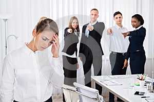 Frustrated Female Colleague In Office