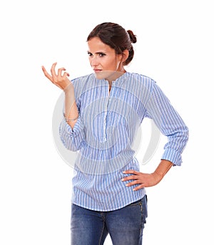 Frustrated hispanic woman asking a question photo