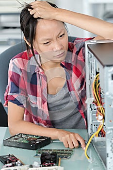 frustrated intern trying to fix computer photo