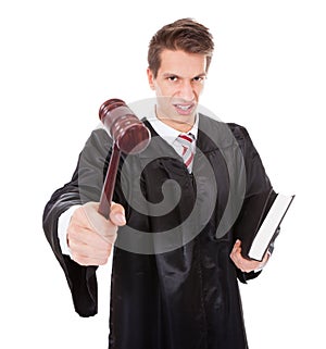 Frustrated Judge With Gavel And Book