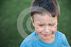 frustrated kid. Crying baby. Closeup portrait stressed sad boy