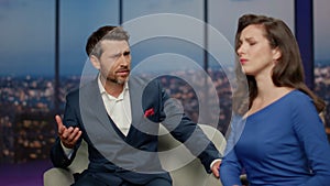 Frustrated man talking interview tv show to sympathizer presenter close up.