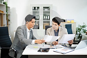 Frustrated manager scolds employee in office over financial error. Concept of workplace stress, reporting issues, conflict