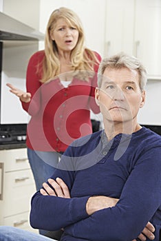 Frustrated Mature Couple Having Arguement At Home photo