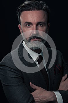 Frustrated middle aged elegant man Close up face of stressed businessman wearing stylish suit with eyes closed