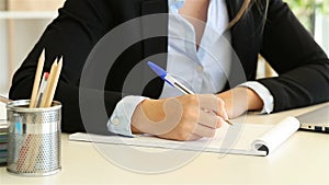 Frustrated office worker crumpling paper