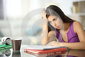 Frustrated student complaining at home