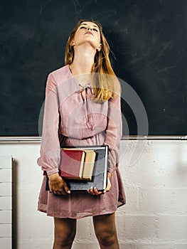 Frustrated student in front of blackboard