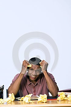 Frustrated Teen With Crumpled Paper - Vertical