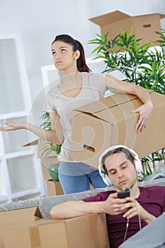 Frustrated woman with idle boyfriend