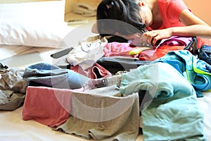 Frustrated woman packing