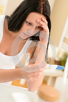 Frustrated woman positive pregnancy test result