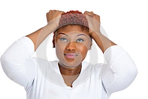 Frustrated woman pulling her hair out, having bad headache, stressed