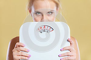 Frustrated woman unhappy with weight gain