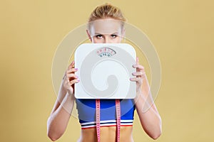 Frustrated woman unhappy with weight gain