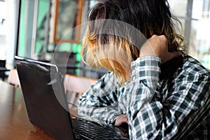 Frustrated young Asian man feeling exhausted and tired his work in office