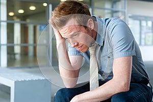 Frustrated young, handsome businessman